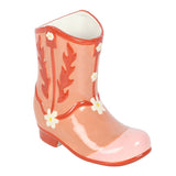 Peach-colored rain boot with floral design on a white background