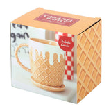 Caramel waffle-themed mug and coaster set in packaging with a waffle cone design.