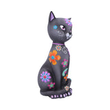 Decorative cat figurine with colorful floral designs on a white background
