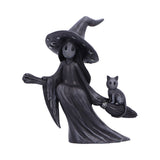 Black witch figurine with a broom and cat on a white background