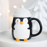 Penguin-shaped mug with a white hat on a light background