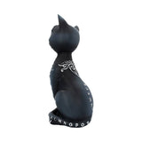 Black cat figurine with white patterns on a white background