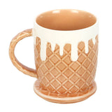 Ceramic mug with waffle cone design on a white background