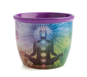 Colorful cup with a chakra design on a white background