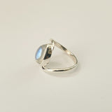 Silver ring on a light gray background