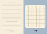 Calendar page for January with a blue background and beige text area.