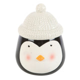 Ceramic penguin with a white knit hat on a white background