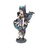 Fantasy fairy figurine with dark hair and colorful dress on a white background