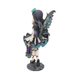 Fantasy fairy figurine with purple hair and teal wings on a white background