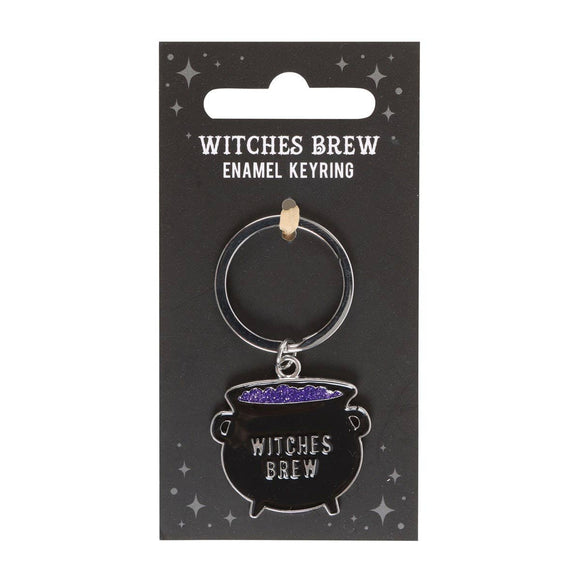 Witches Brew enamel keyring on a black card with 'Witches Brew' text