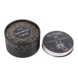 Set of astrology cards with a circular black box featuring astrological symbols.