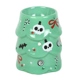 Green mug with Halloween-themed decorations on a white background