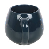 Black mug with a handle on a white background
