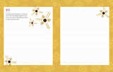 Notebook with decorative pages on a gold background