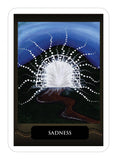 Card with a central light symbol and 'Sadness' text against a dark background