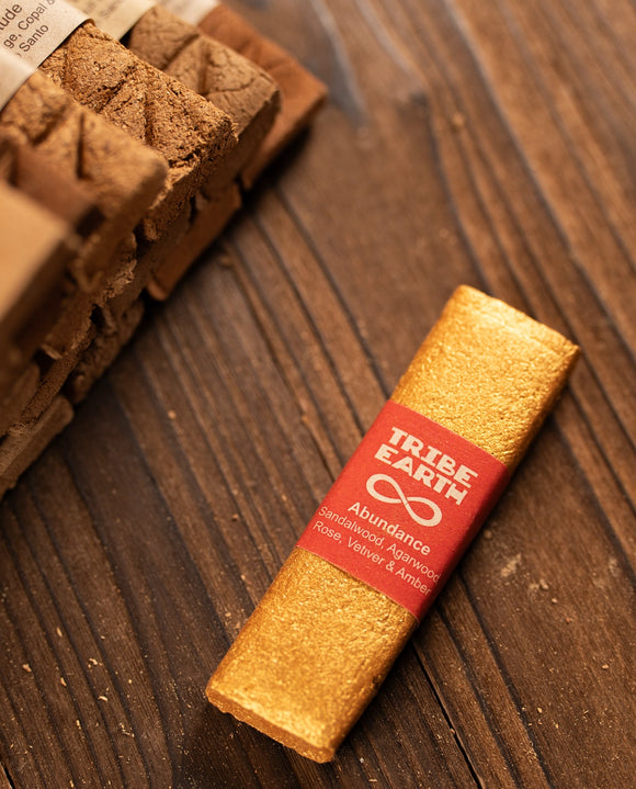 Tribe Earth Abundance bar on a wooden surface