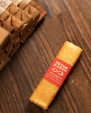 Tribe Earth Abundance bar on a wooden surface