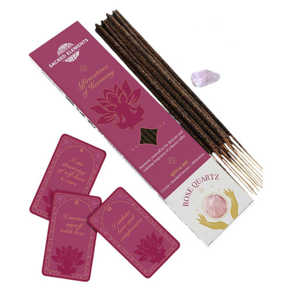 Incense sticks, tarot cards, and a card with 'Rose Quartz' on a white background