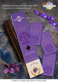Amethyst incense sticks, cards, and crystals with 'Sacred Elements' branding on a textured surface.