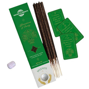 Incense sticks with packaging and cards on a white background