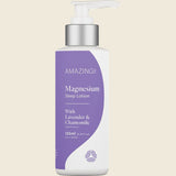Bottle of magnesium sleep lotion with lavender and chamomile on a beige background