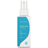 Bottle of Amazing Magnesium Daily Spray on a beige background