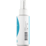 White spray bottle with blue label on a beige background