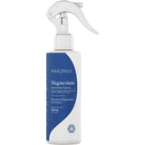 Bottle of Amazing Magnesium Sensitive Spray on a beige background