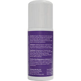 Purple bottle with white cap on a beige background