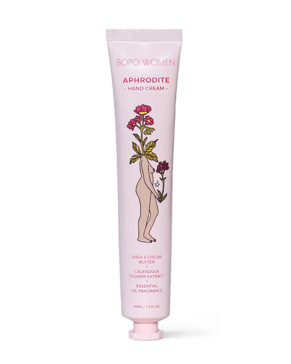 Hand cream tube labeled 'Aphrodite' with floral design on a white background
