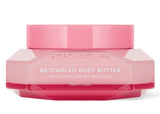 Pink jar of Bopo Women Bejeweled Body Butter on a white background