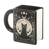 Black mug with a design of a black cat and 'Book of Spells' text on a white background