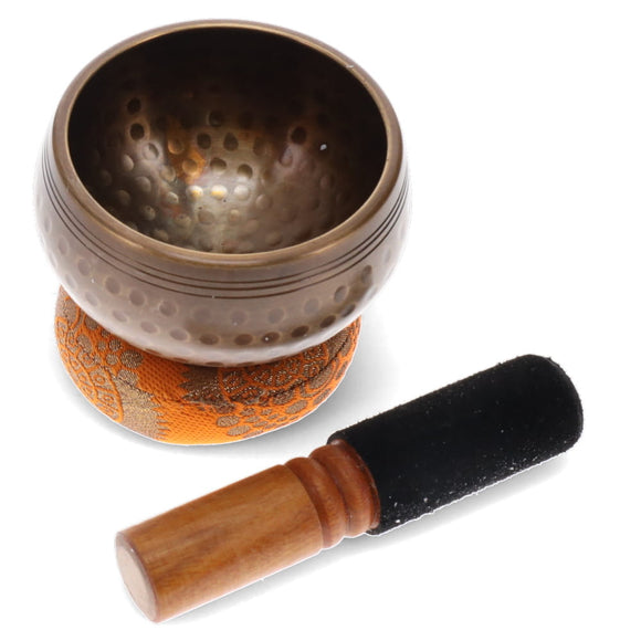 Decorative incense holder with wooden and black brush on a white background