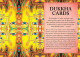 A book or booklet page titled 'DUKKHA CARDS' with a large block of text on a peach background, surrounded by a highly detailed, psychedelic mandala illustration in yellow, green, orange, and blue.