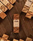 Tribe Earth handmade incense sticks on a wooden surface