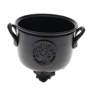Black cauldron with decorative emblem on a white background