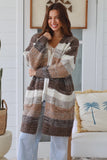 Woman wearing a striped sweater in a home setting
