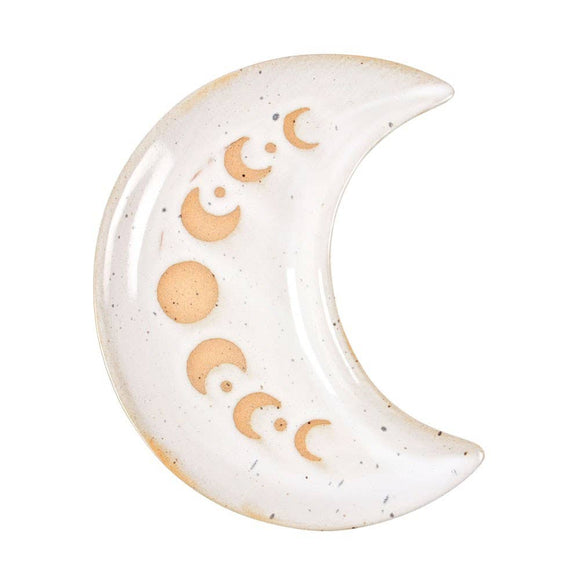 Ceramic moon-shaped decorative item with gold accents on a white background