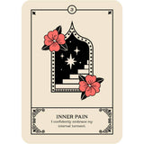 Tarot card with a black and white design and red flowers on a beige background