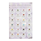 Crystal Advent Calendar packaging with images of crystals on a purple background