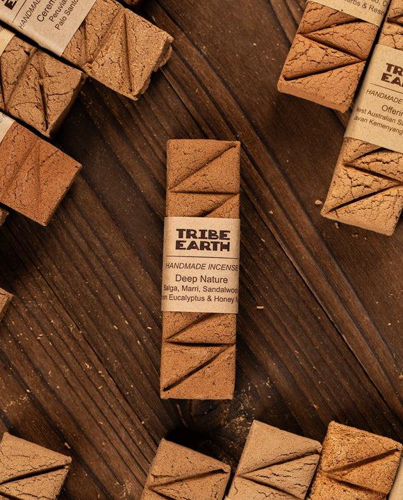 Tribe Earth handmade incense sticks on a wooden surface