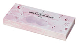 Pink packaging of Dream Eye Mask with decorative elements on a white background