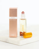Ember rollerball and packaging on a white background
