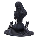 Statue of a woman with dark hair and black cats on her shoulders against a white background
