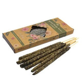 Incense sticks with a decorative box on a white background