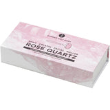 Box of Spiky Crystal Facial Roller Rose Quartz on a white background