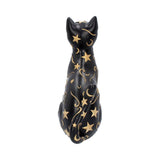 Black cat figurine with gold star and moon patterns on a white background