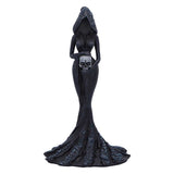 Black figurine of a hooded figure with a skull on a white background