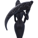 Black decorative hat with intricate patterns on a white background