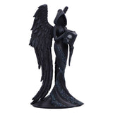 Black angel figurine with wings holding a book on a white background
